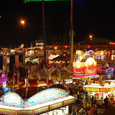 Signs advertising food vendor at the Calgary Stampede.
